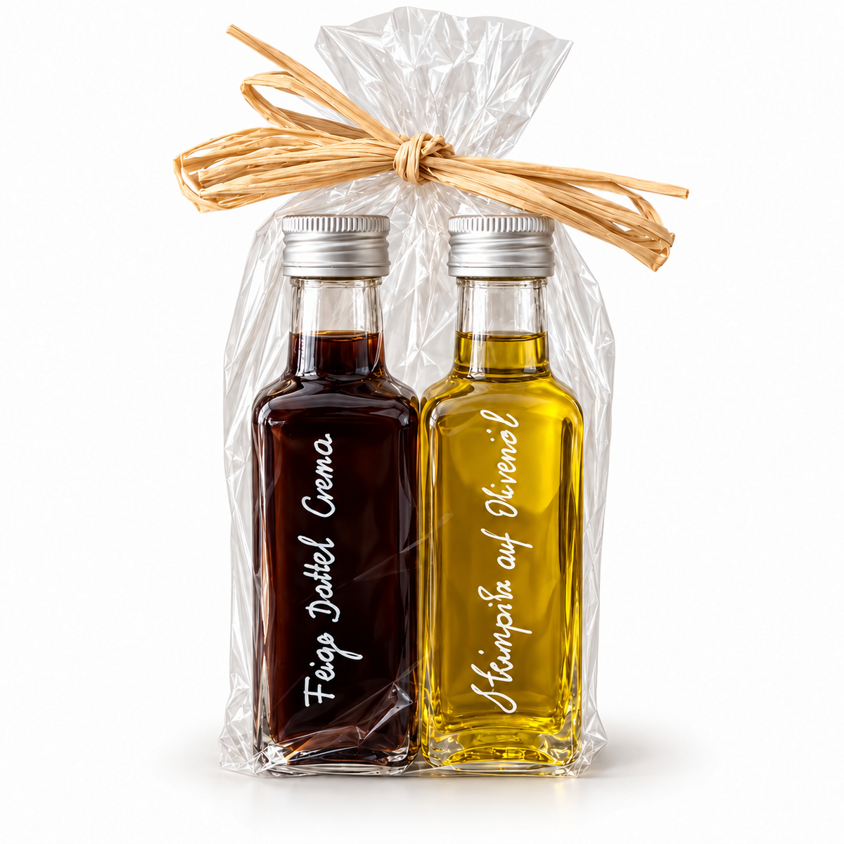 Geschenkset Feige-Dattel Crema und Steinpilz auf Olivenöl, je 100 ml, in Cellophan mit Bast