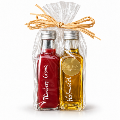 Geschenkset Himbeer Crema und Walnussöl, je 100 ml, in Cellophan mit Bast