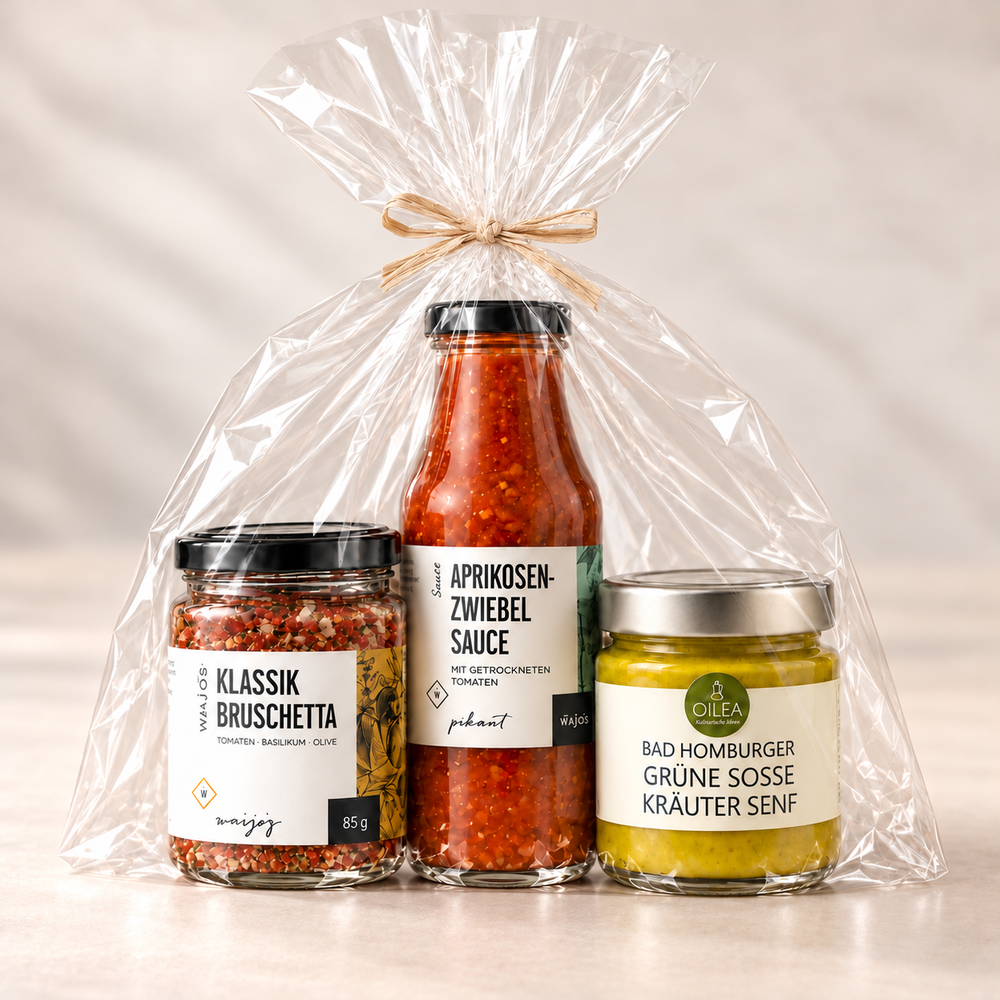 Genuss-Trio in Cellophan verpackt und mit Bast zugebunden